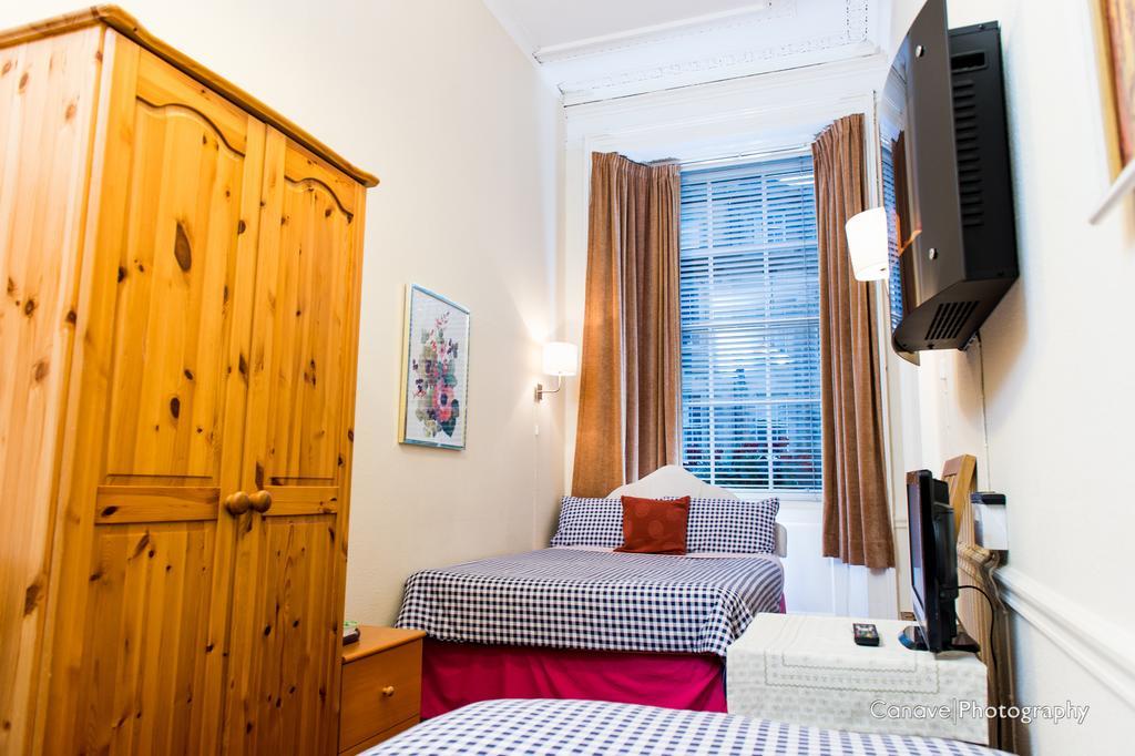 Camera Familiare con Bagno in Comune